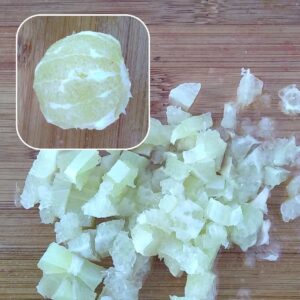 a peeled lime and chopped lime