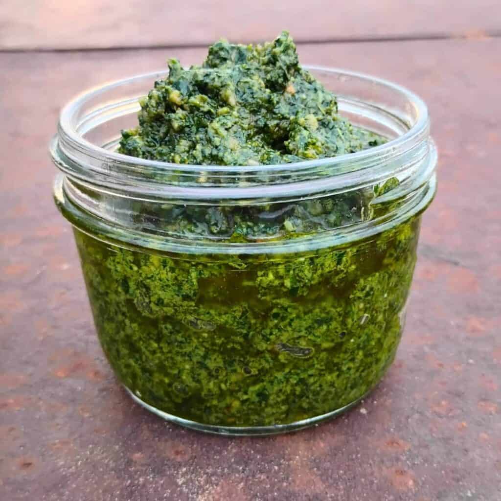 jar full of homemade wild herb pesto.