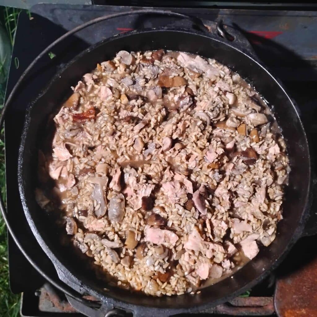 Everything has been added to the Mushroom risotto except the parmesan cheese. It is getting heated to a simmer again