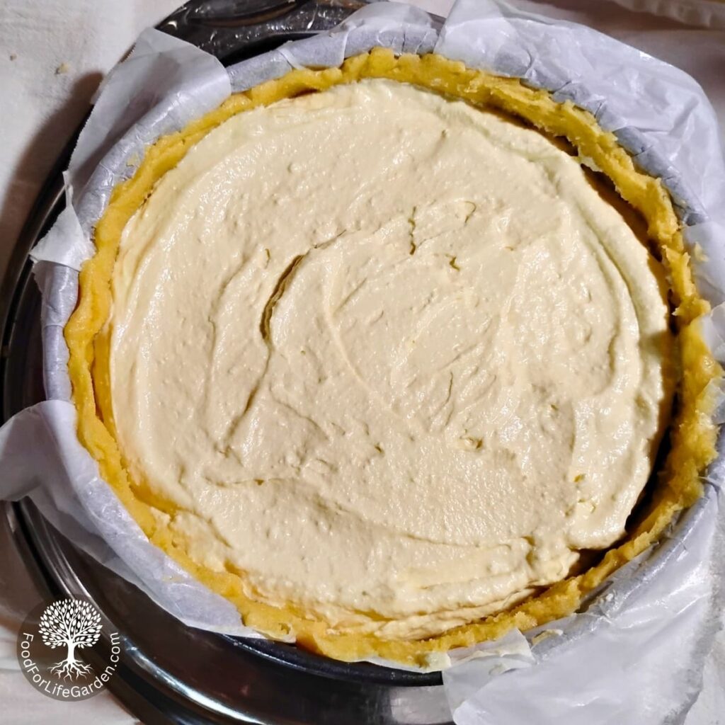The cheesecake is all assembled and ready for baking.