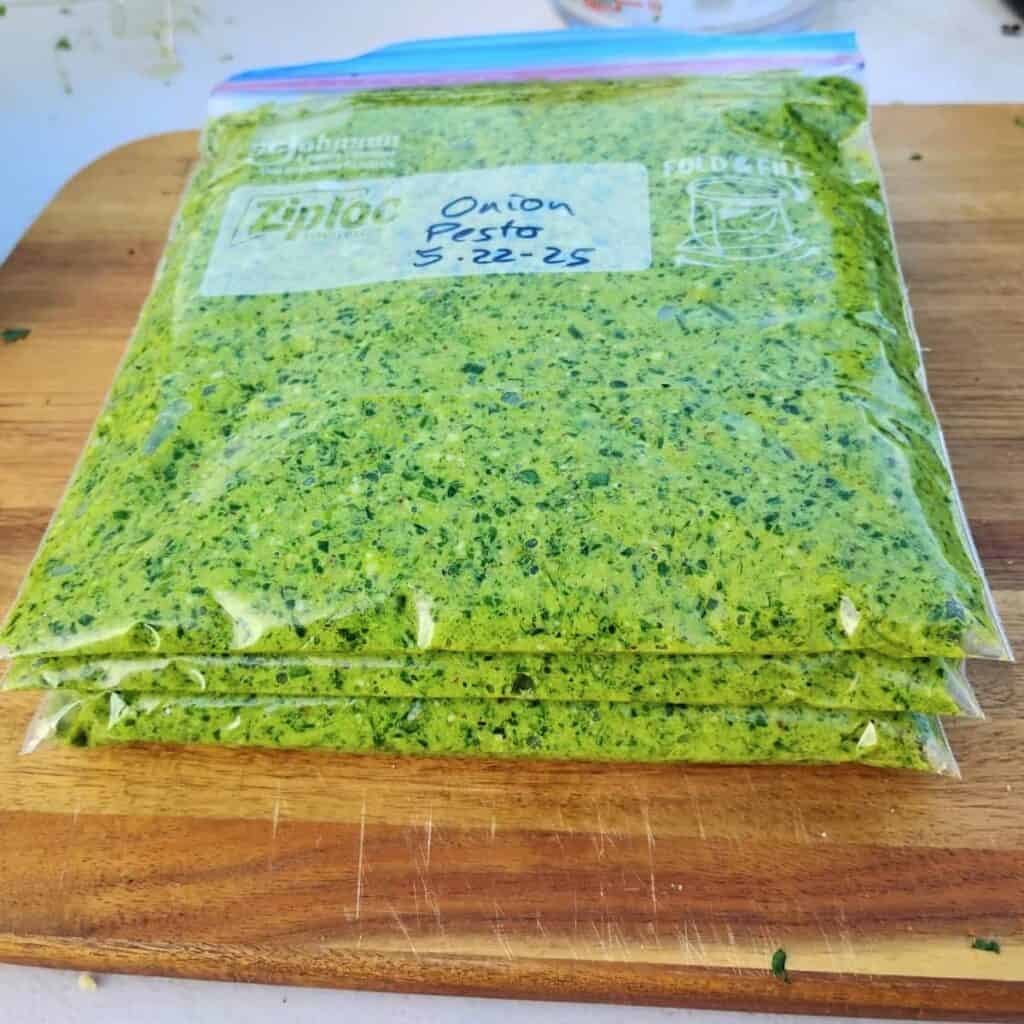 freezer bags filled with garlic scape pesto.