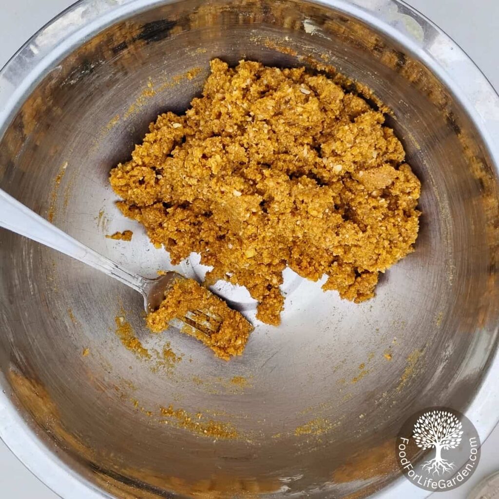 bowl with honey lemon spice cookie dough reaady for forming into cookies.