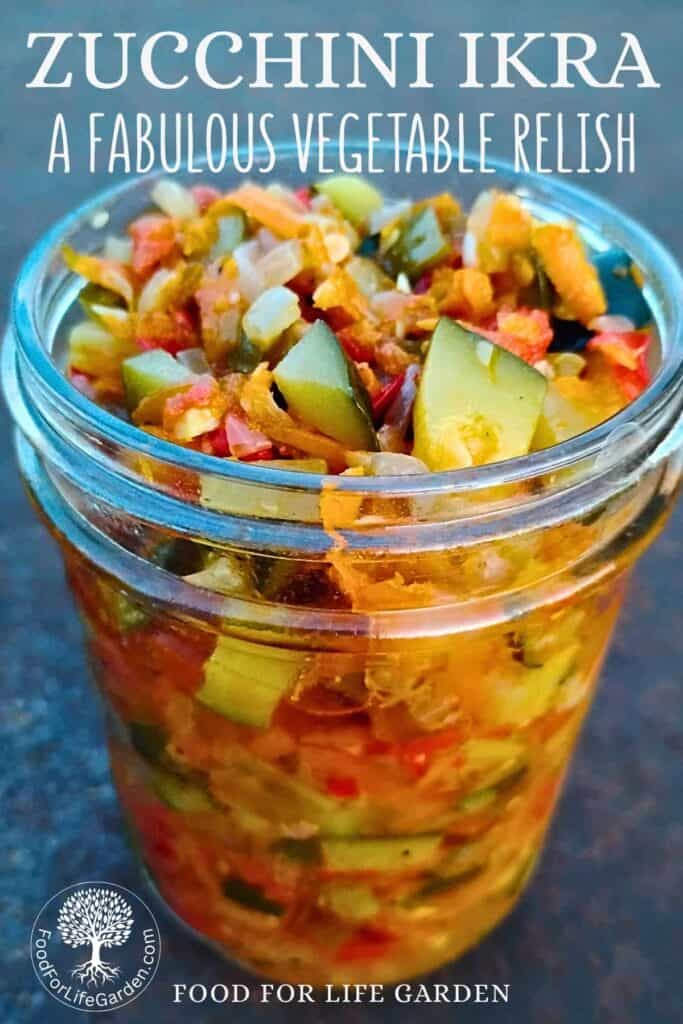 photo shows a pint jar filled with fresh made zucchini ikra and juices. text overlay reads zucchini ikra, a fabulous vegetable relish. food for life garden.