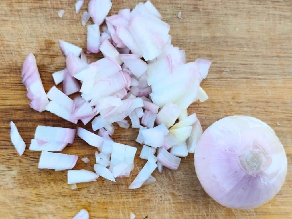 chopped onion on a cutting board.