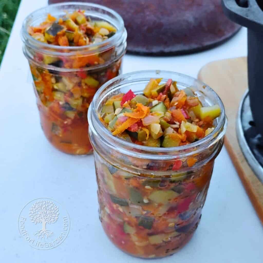 zucchini ikra getting filled into pint jars to store in the refrigerator.