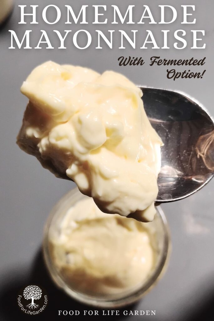 photo of a spoon removing some homemade fermented mayonnaise out of a jar below it. text overlay reads homemade mayonnaise with fermented option. food for life garden. 