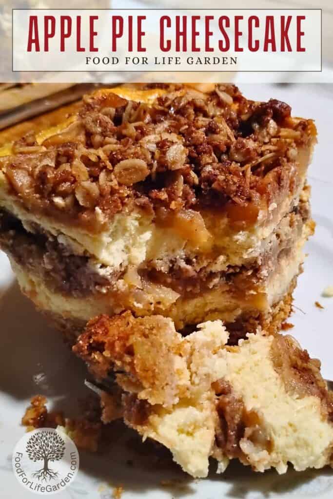 A piece of apple pie cheesecake on a plate with a portion removed by a fork. text overlay reads apple pie cheesecake. food for life garden.