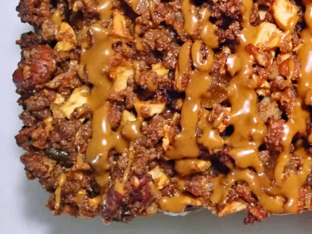 close-up shot of the maple glazed, drizzled over the cake.