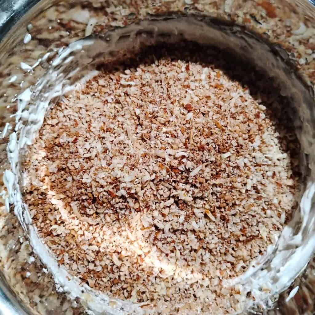nut meal was dumped over the meringue cream.