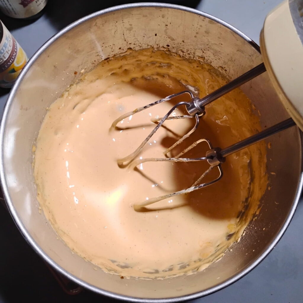 egg yolk and sugar creamed in a bowl. 