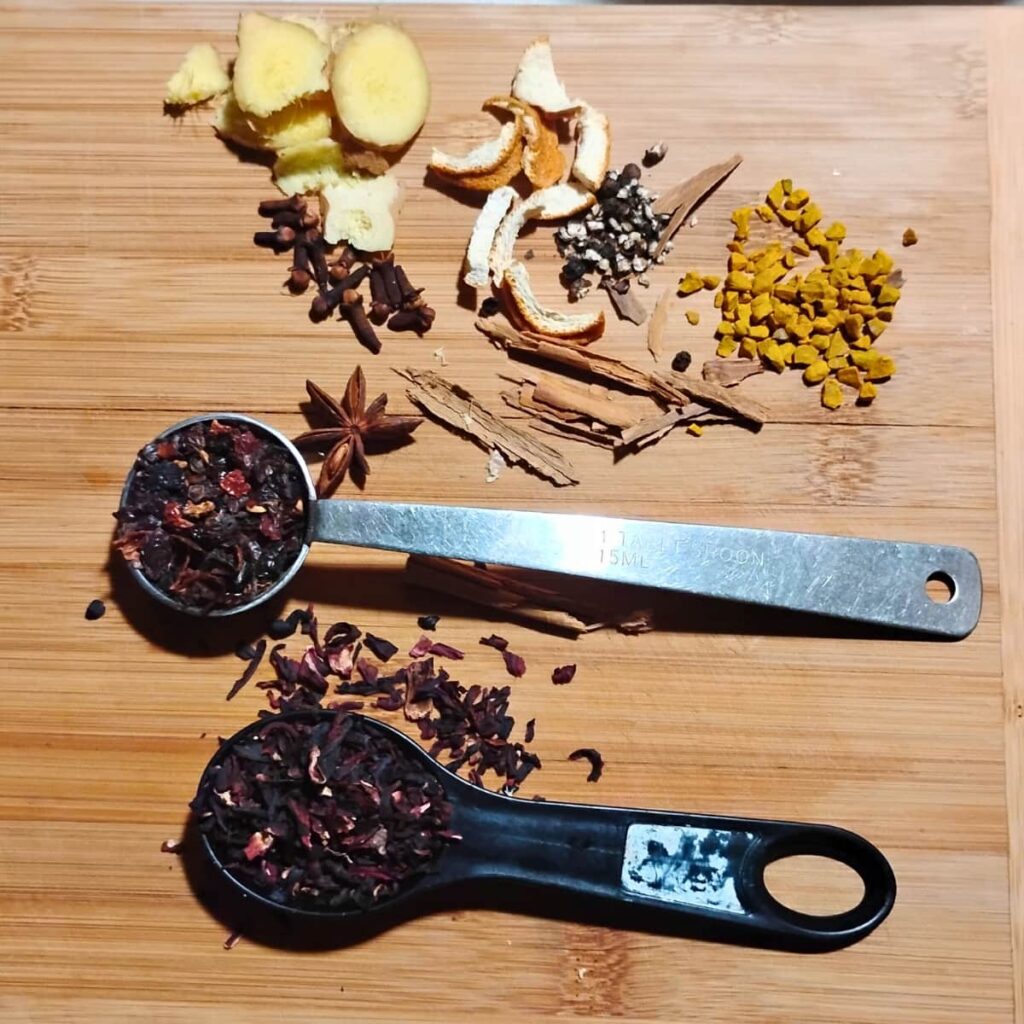 rosehips, hibiscus, and spices to go into the tea.