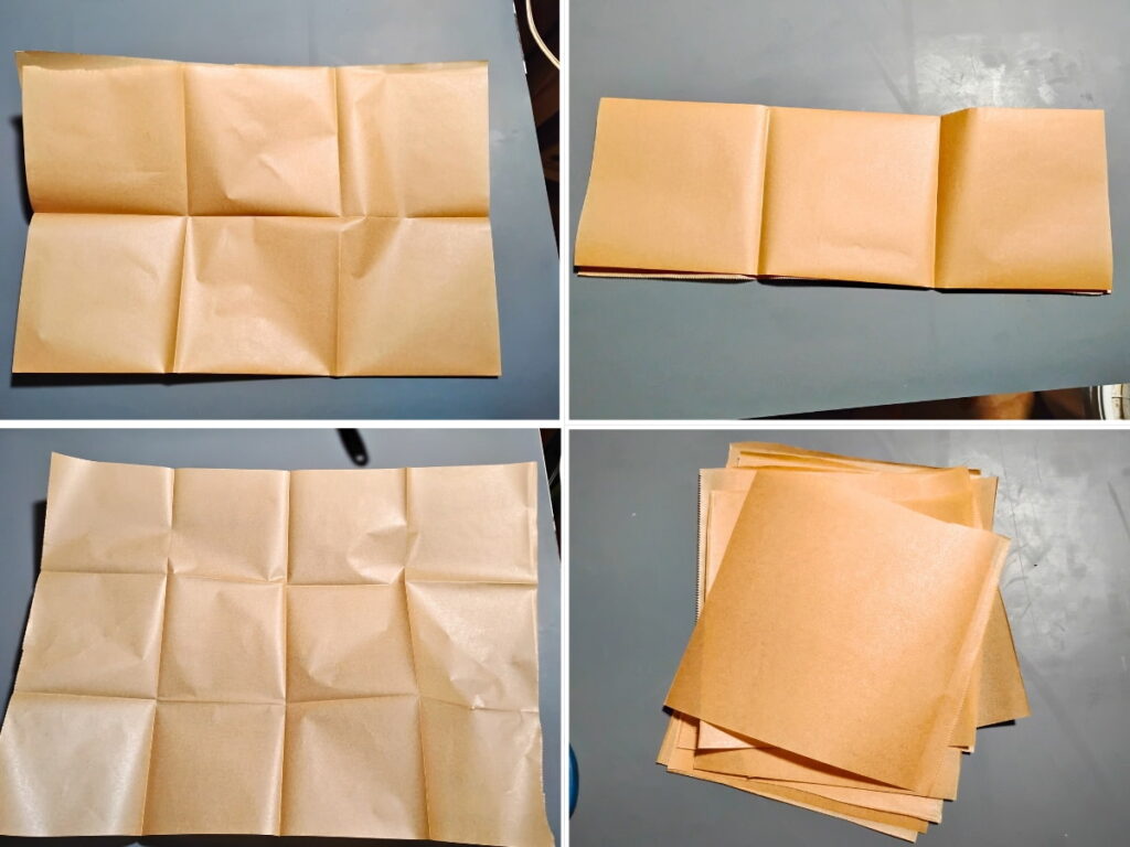 folding a piece of parchment paper to form lines to cut along and a stack of cut up parchment squares for making muffin liners.