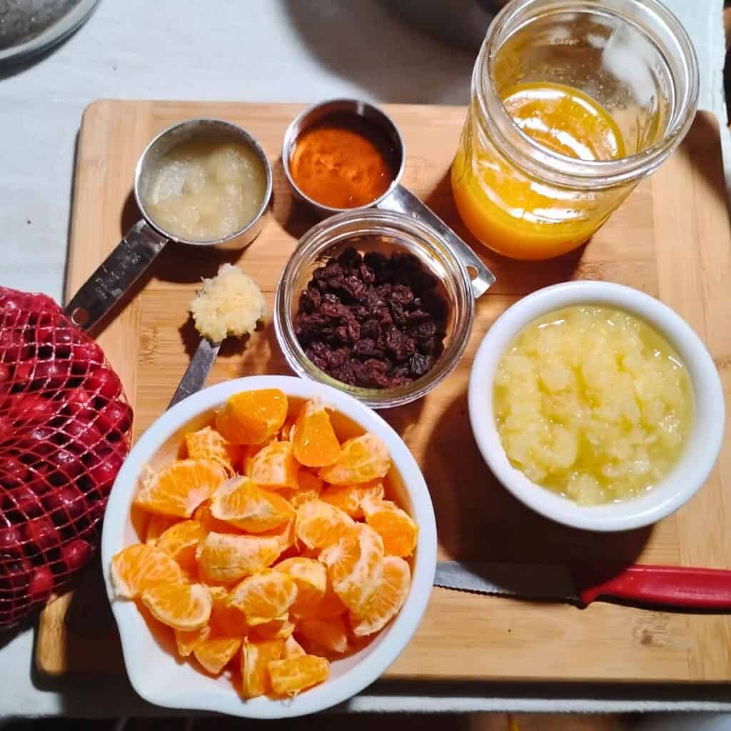 some ingredients to make the cranberry orange sauce and salad.