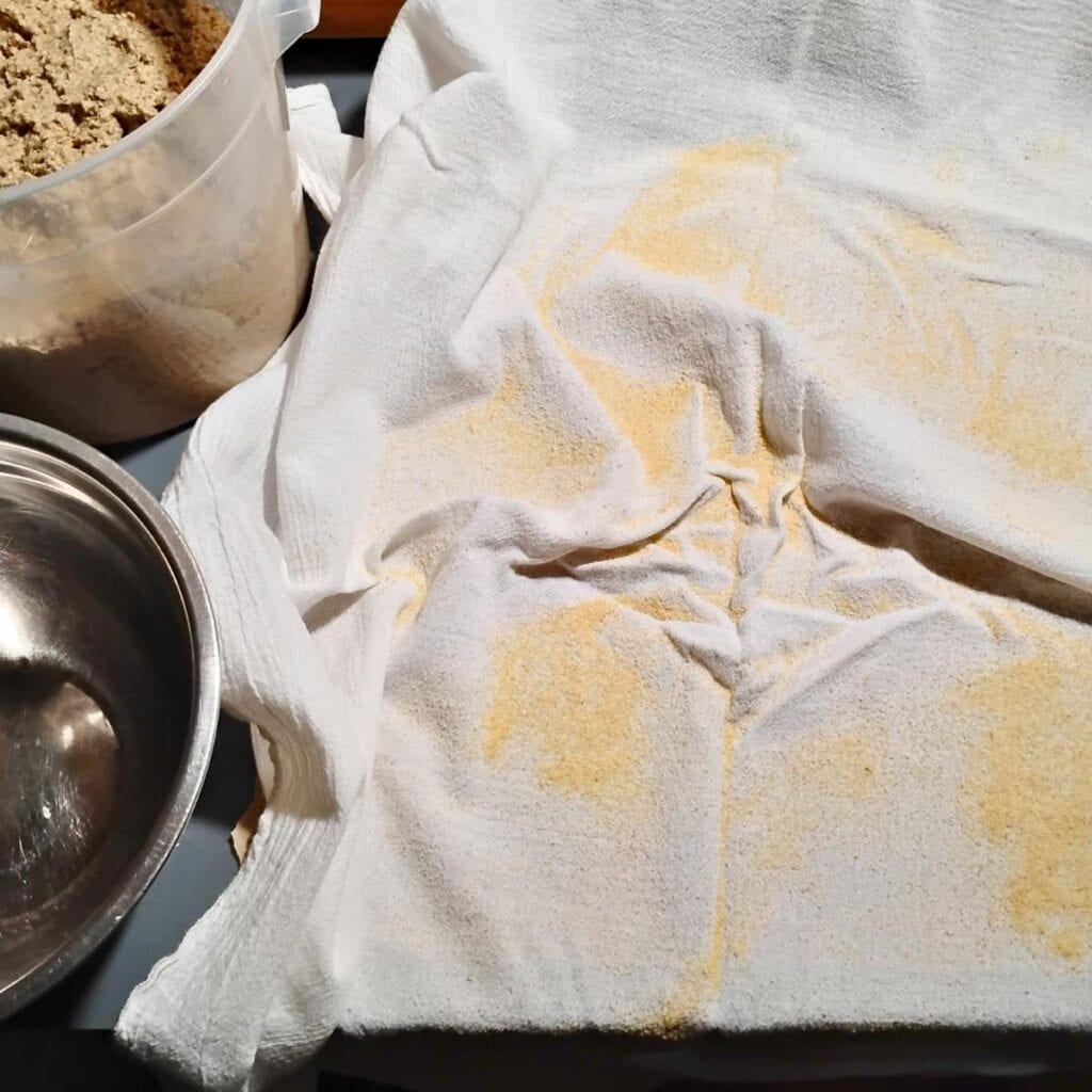 a floured cloth on a table. 