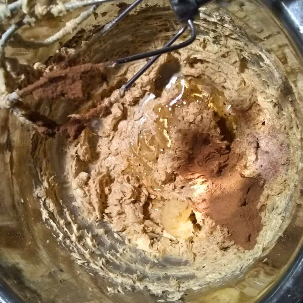 spices are added to the creamed butter, sucanat, and egg.