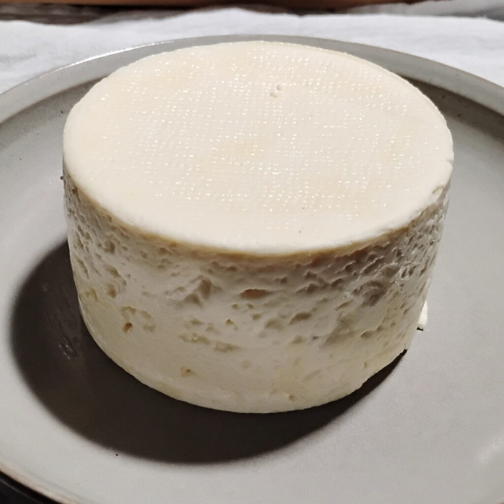 bel paese cheese after 3 weeks in the fridge. It develops a greasy layer that needs to be wiped off.